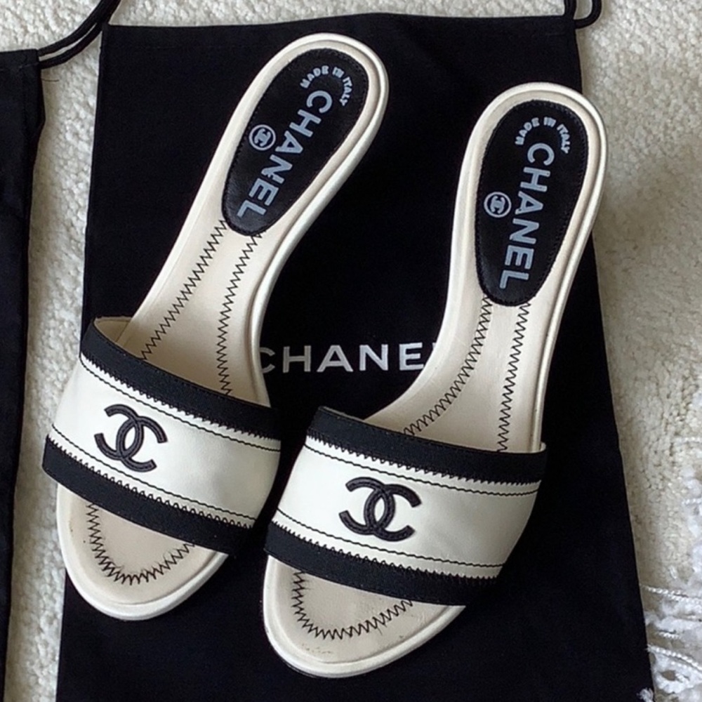Vintage black and white Chanel mules